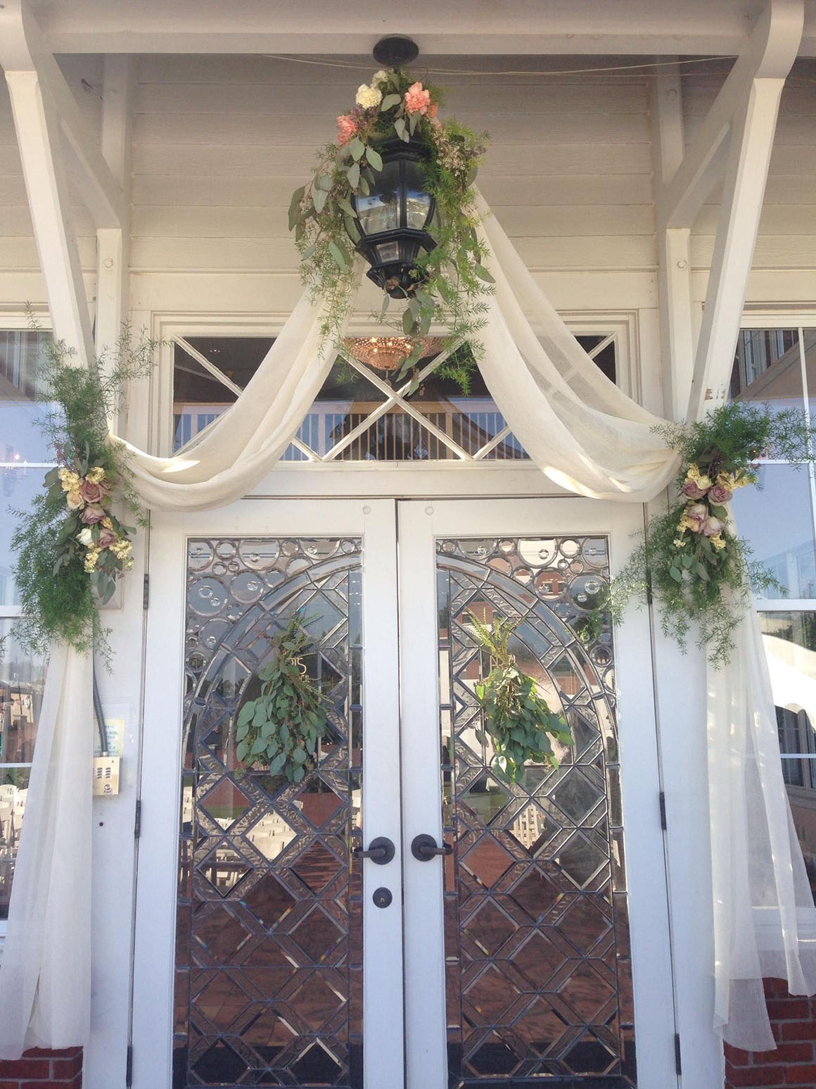 Beautiful bevelled glass doors leading into the atrium